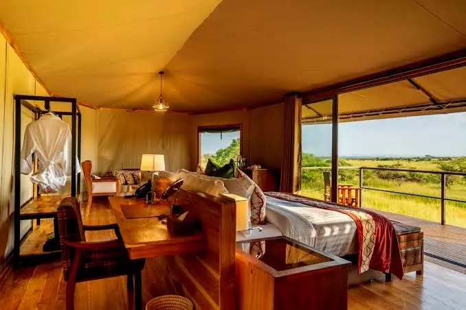Luxury tented suite opening onto a private deck