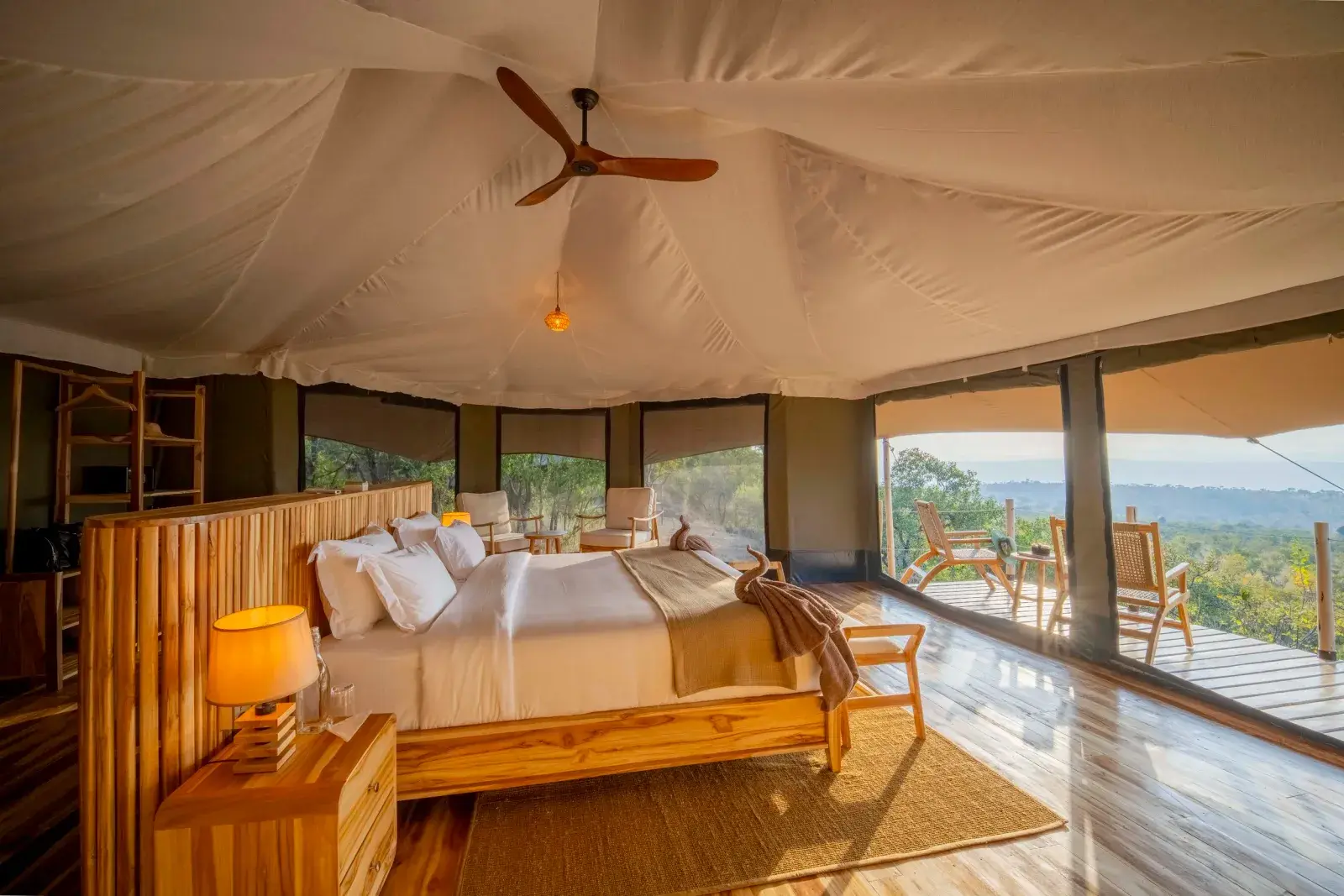 Tented room with a double bed and a private deck