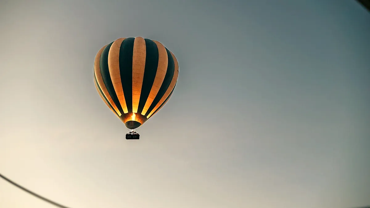 A hot-air balloon in the sky on a balloon safari